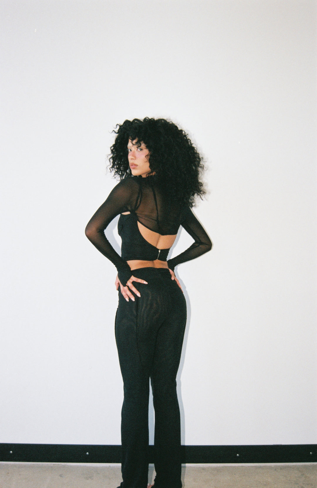 V CUT SHRUG IN BLACK ECO MESH