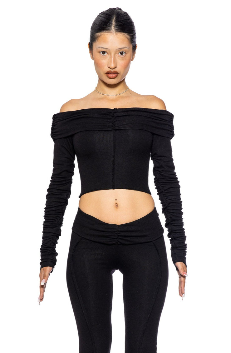 FOLD OVER SHIRRED LONG SLEEVE TOP IN BLACK ECO RIB