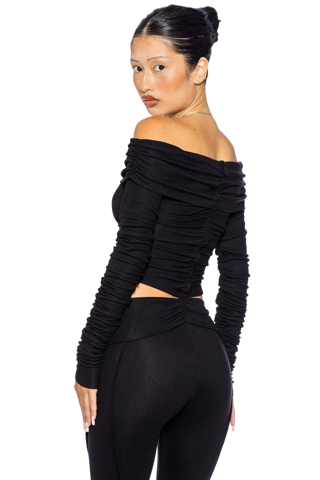 FOLD OVER SHIRRED LONG SLEEVE TOP IN BLACK ECO RIB