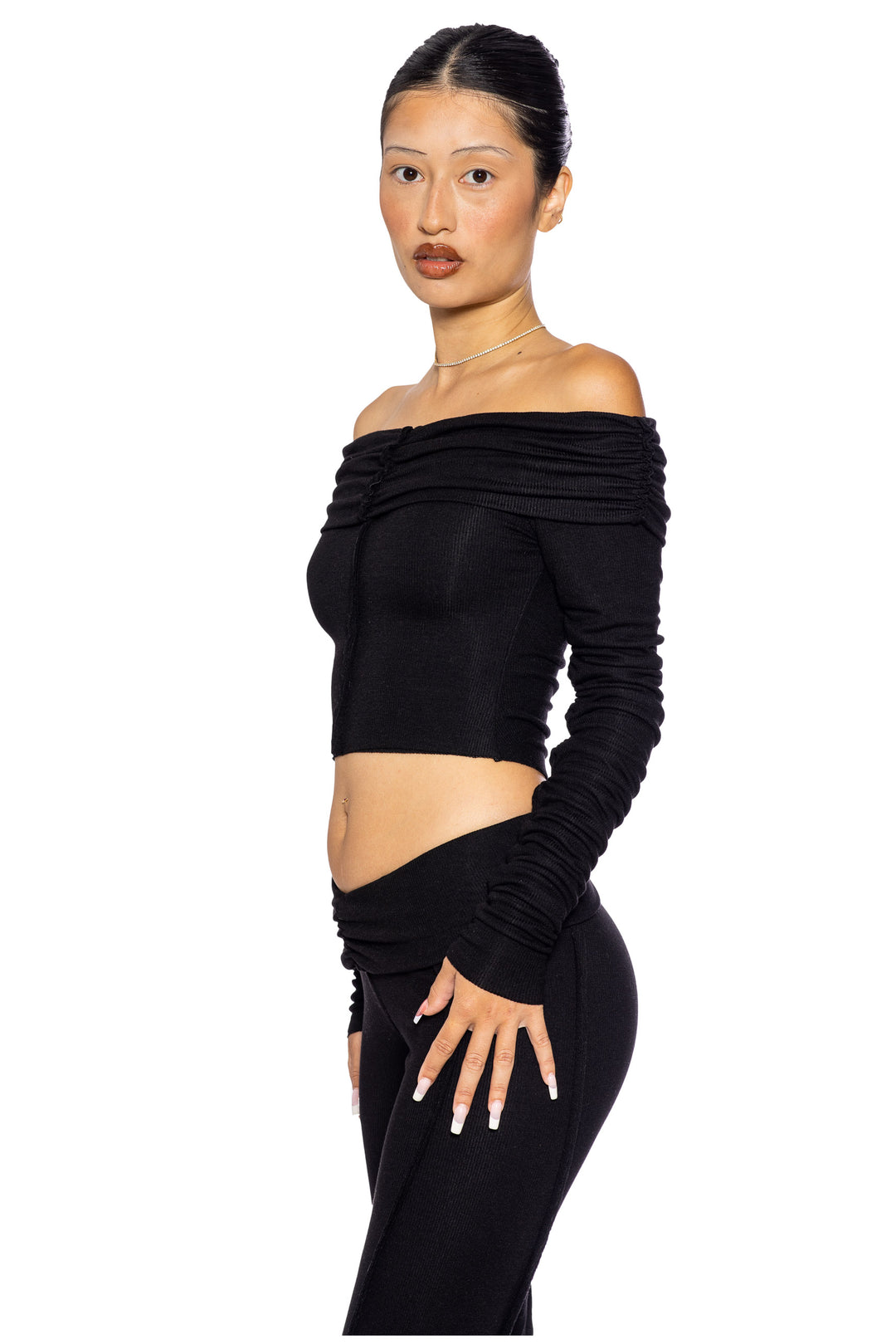 FOLD OVER SHIRRED LONG SLEEVE TOP IN BLACK ECO RIB