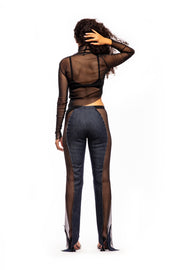 ASYMMETRIC RAW TURTLENECK IN BLACK MESH