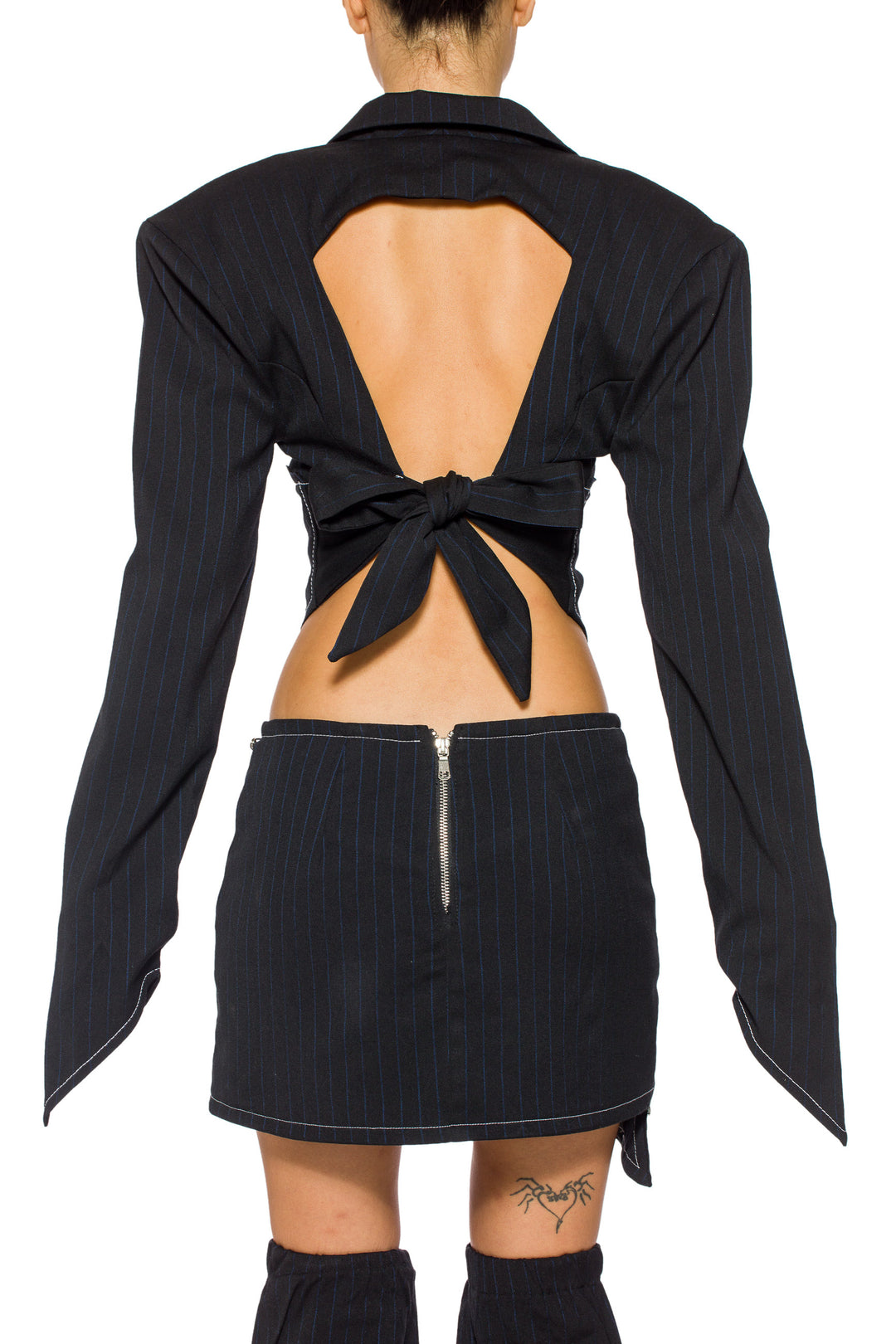 V LINE SKIRT IN BLACK PIN STRIPE SUITING